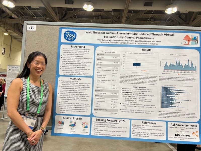 Dr. Tracy Burton with PAS conference poster